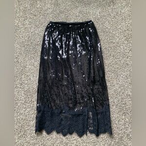 Express lace trimmed sequin skirt
